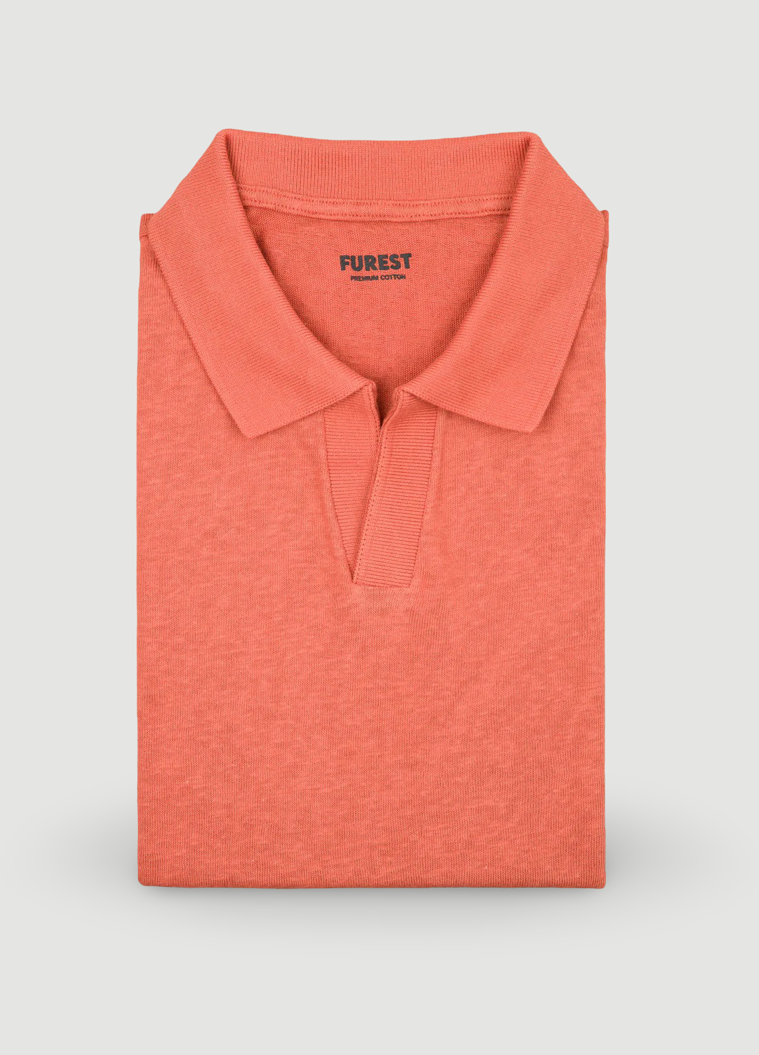Short-sleeved V-neck polo in tile.