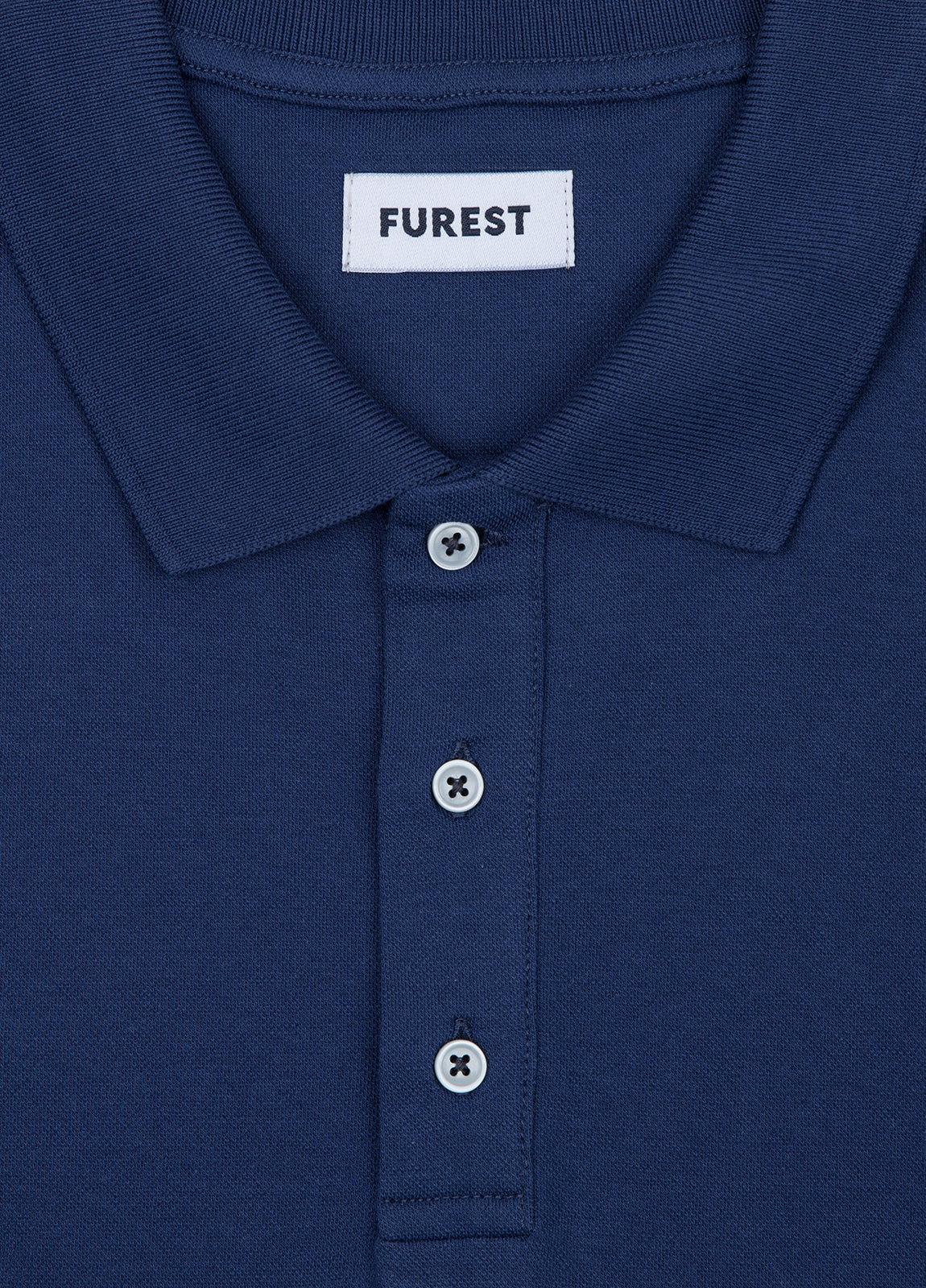 Blue piqué short-sleeved polo shirt
