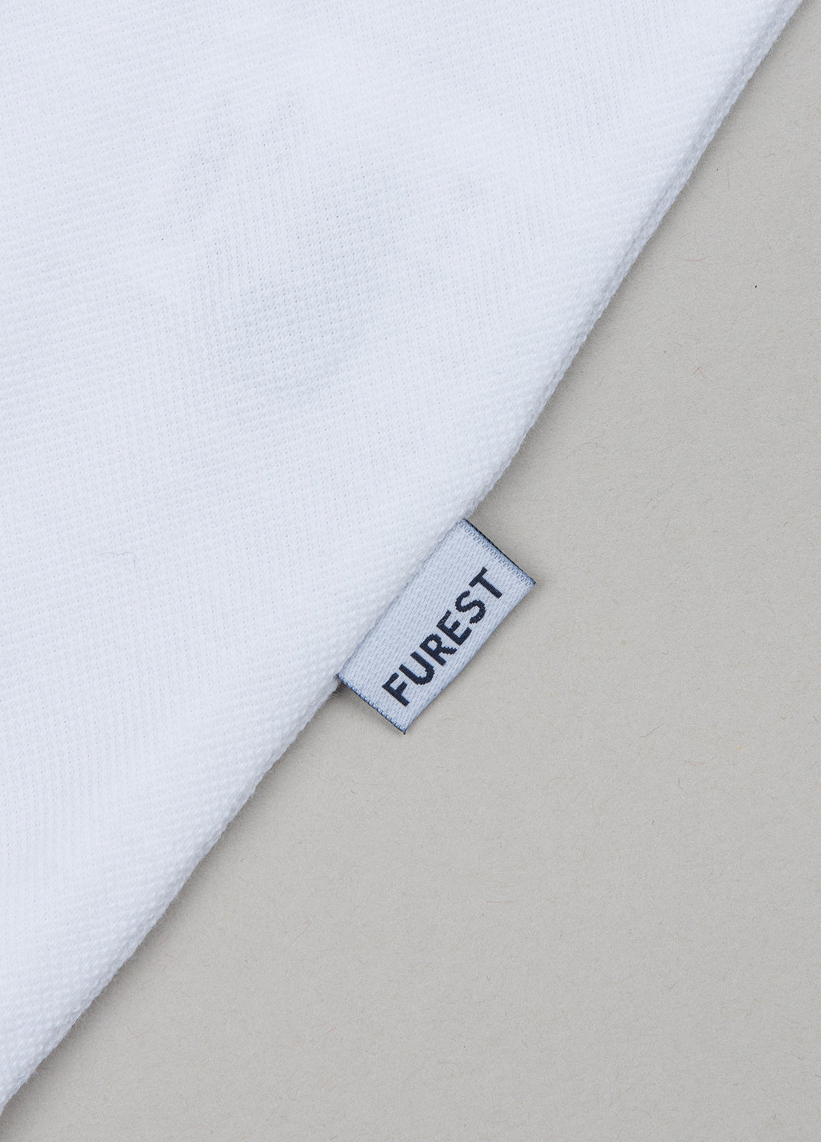 White piqué short-sleeved polo shirt