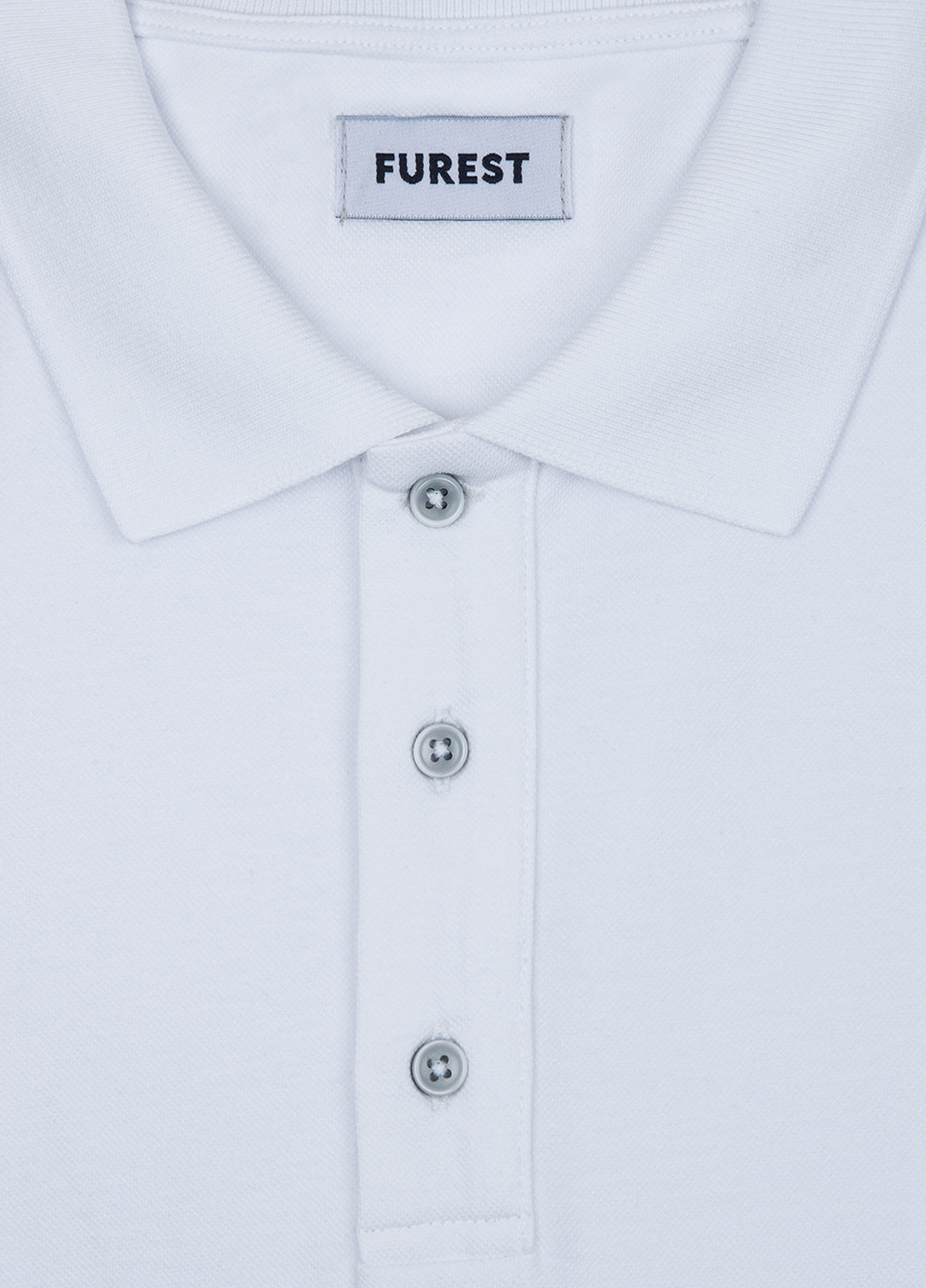 White piqué short-sleeved polo shirt