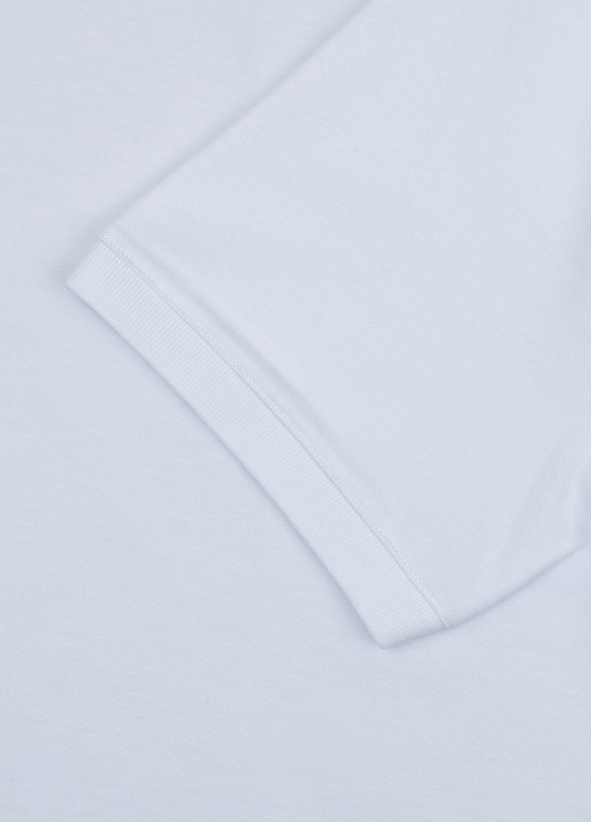 White piqué short-sleeved polo shirt