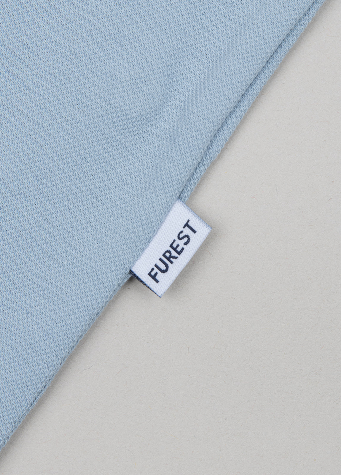 Light blue pique short-sleeved polo shirt