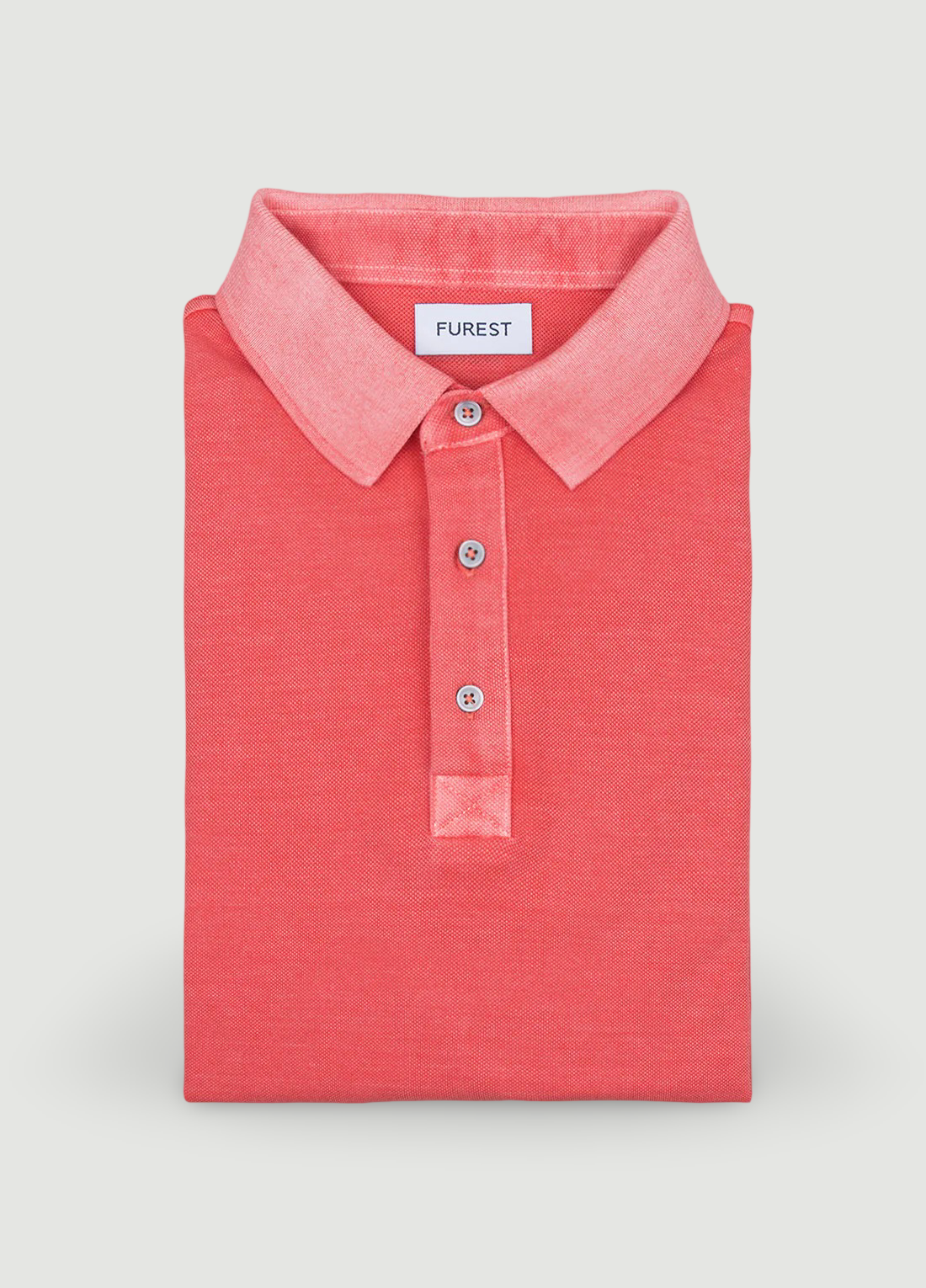 Polo manga corta garment dye pique coral