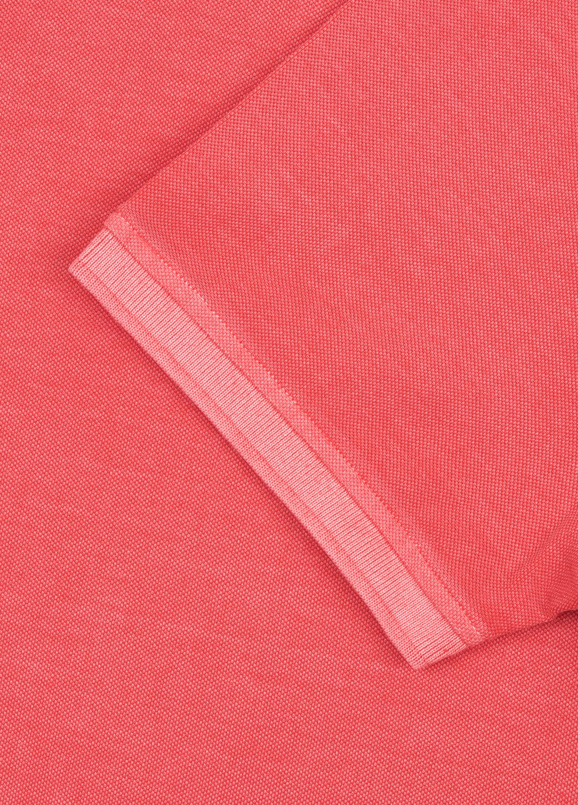 Polo manga corta garment dye pique coral