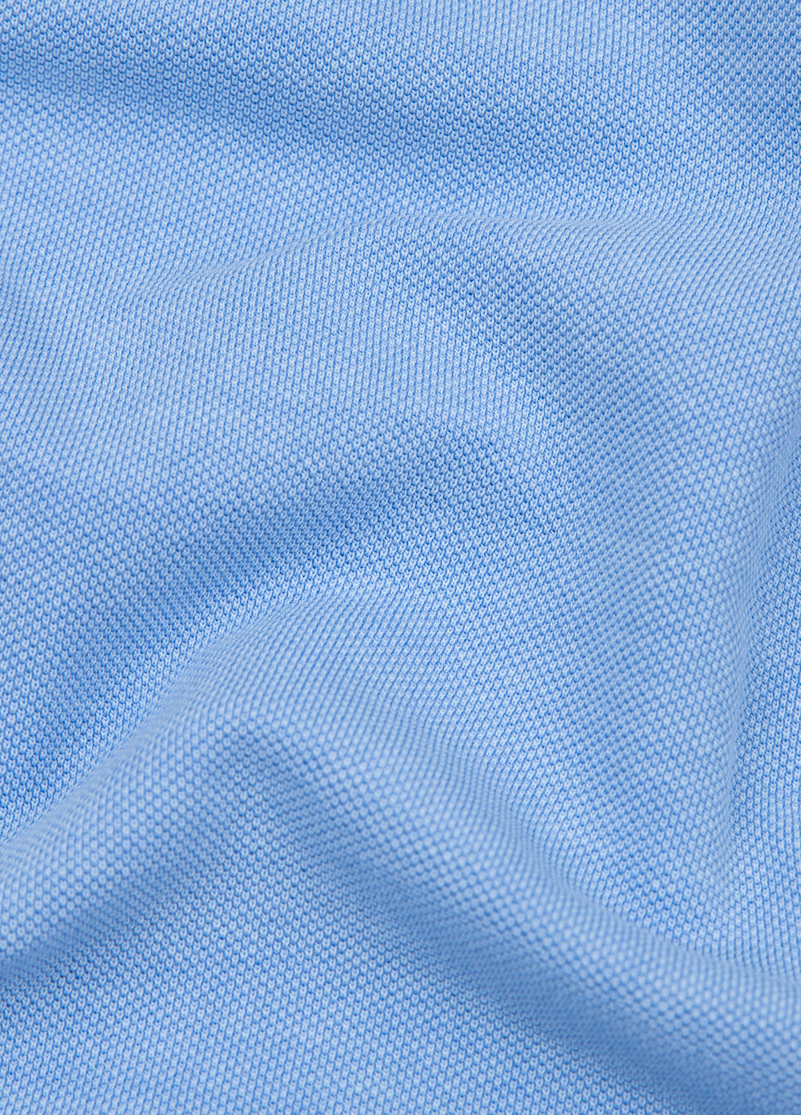 Polo manga corta garment dye pique celeste