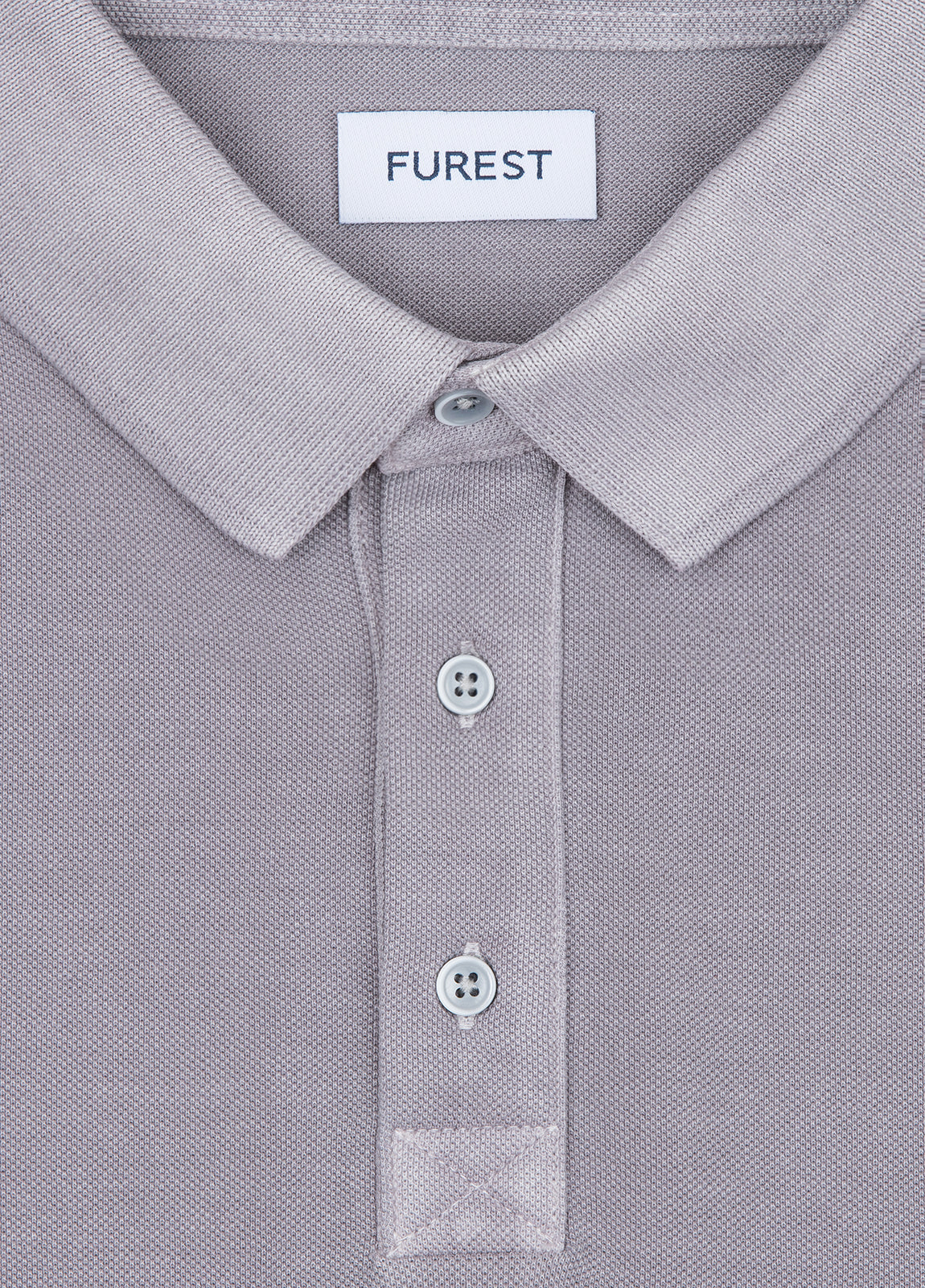 Polo manga corta garment dye pique gris