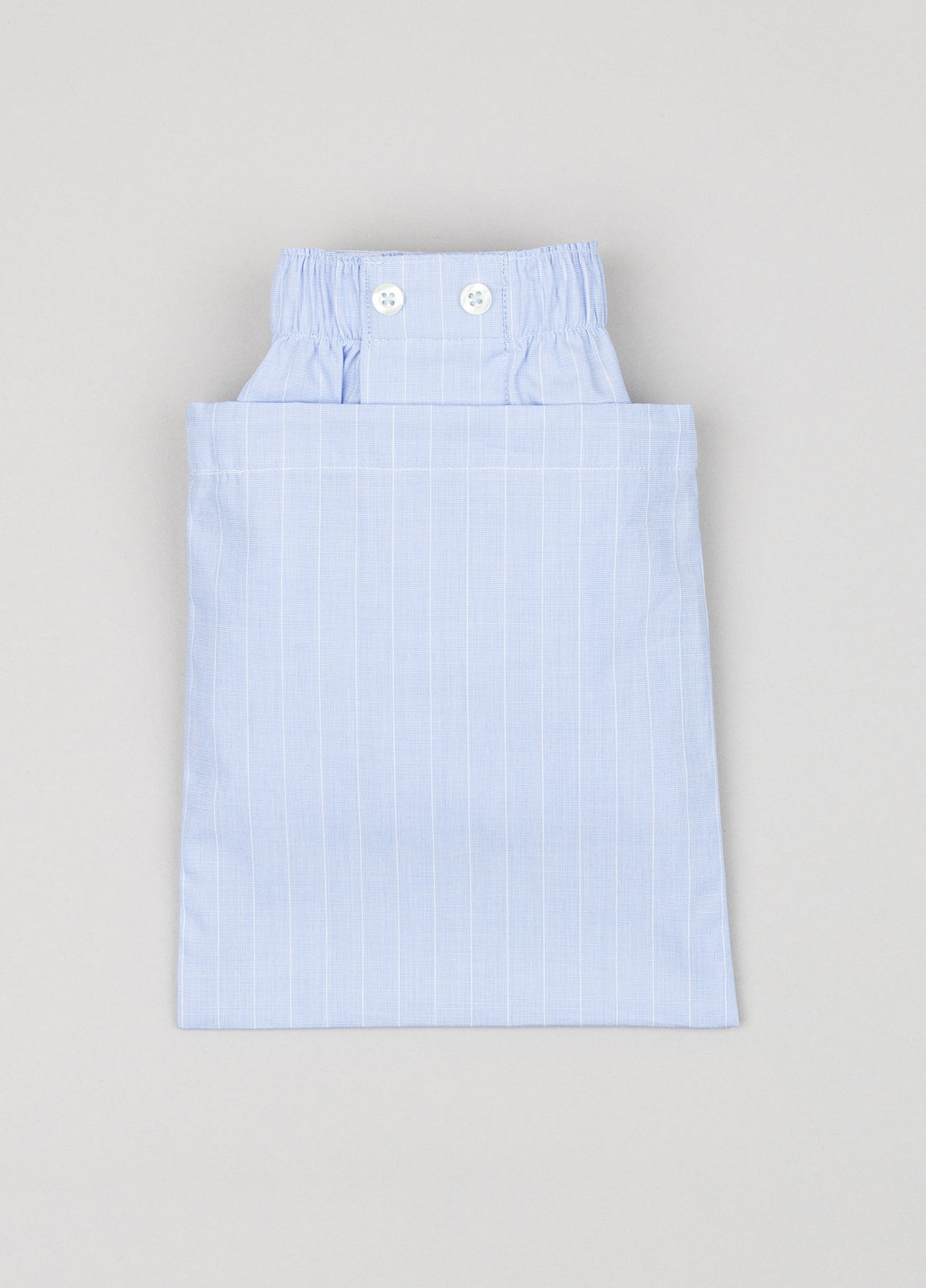 Light blue boxer with white stripes