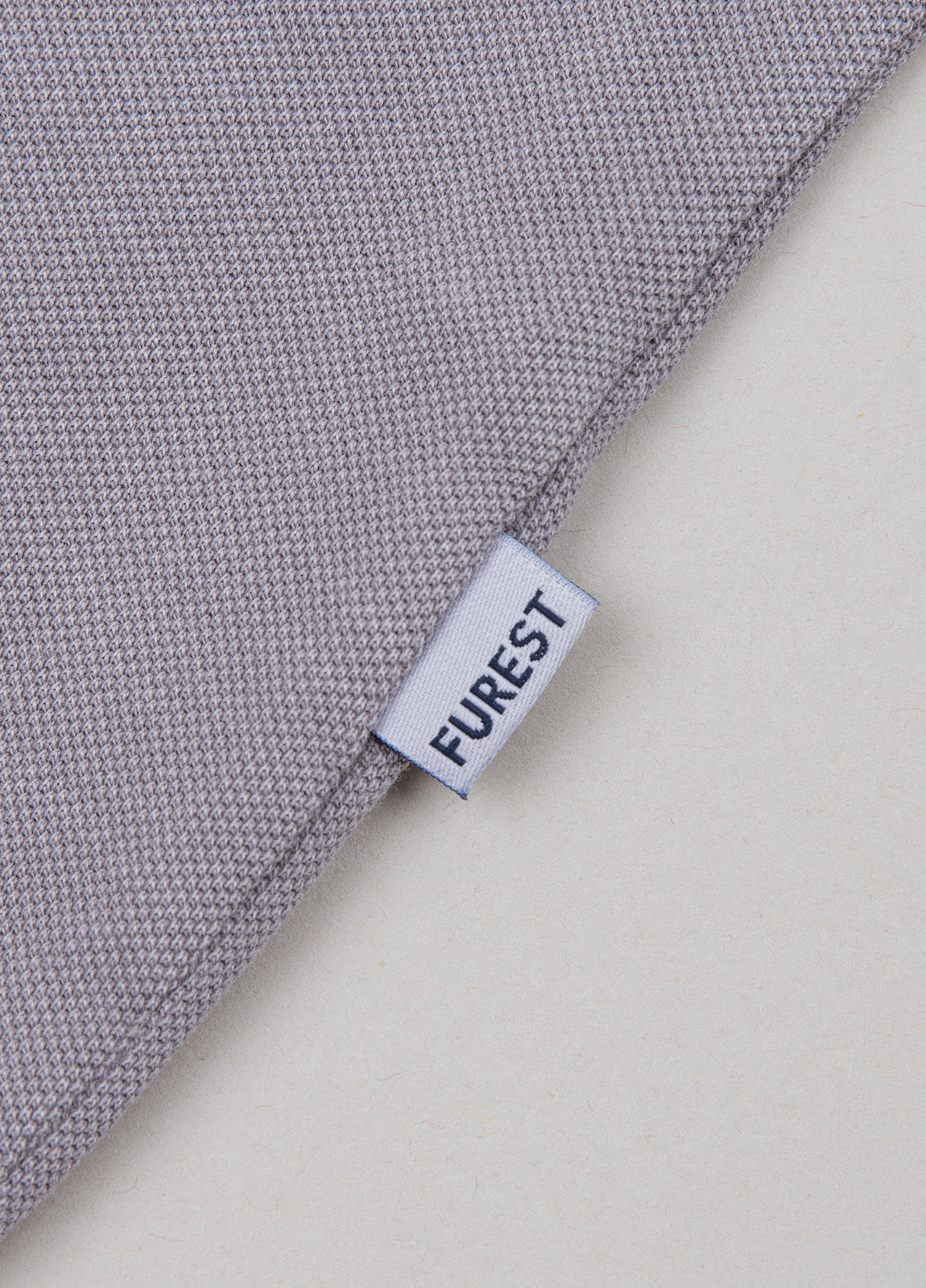 Polo manga corta garment dye pique gris