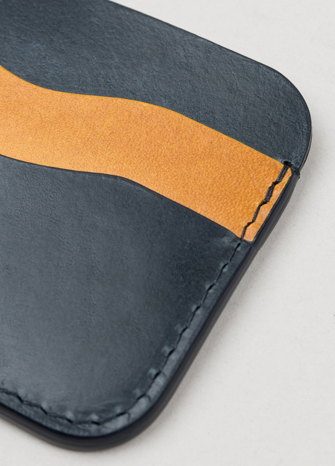 Navy and tan leather card holder