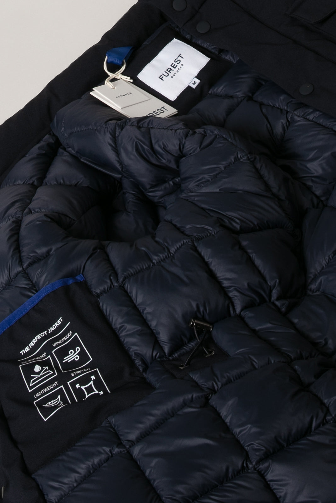 Parka acolchada azul marino
