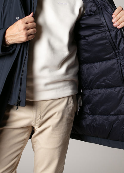 Navy blue technical parka with hood