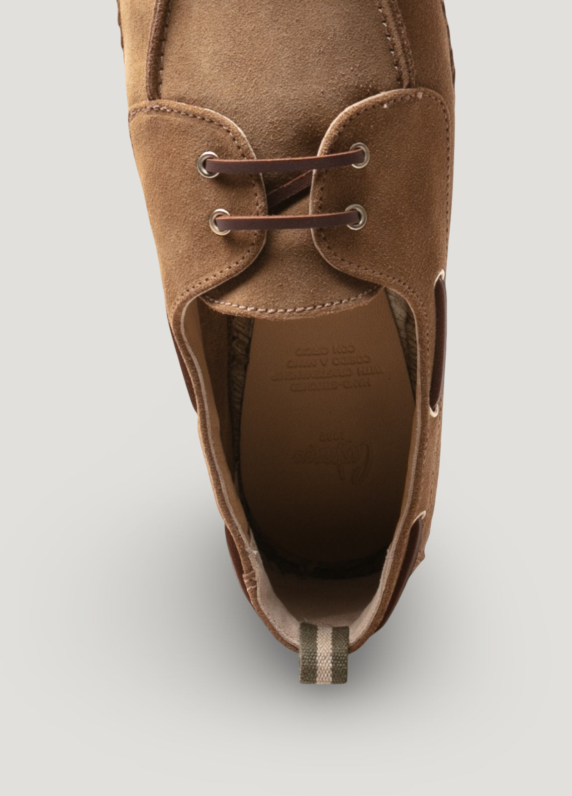 Tan suede boat shoe
