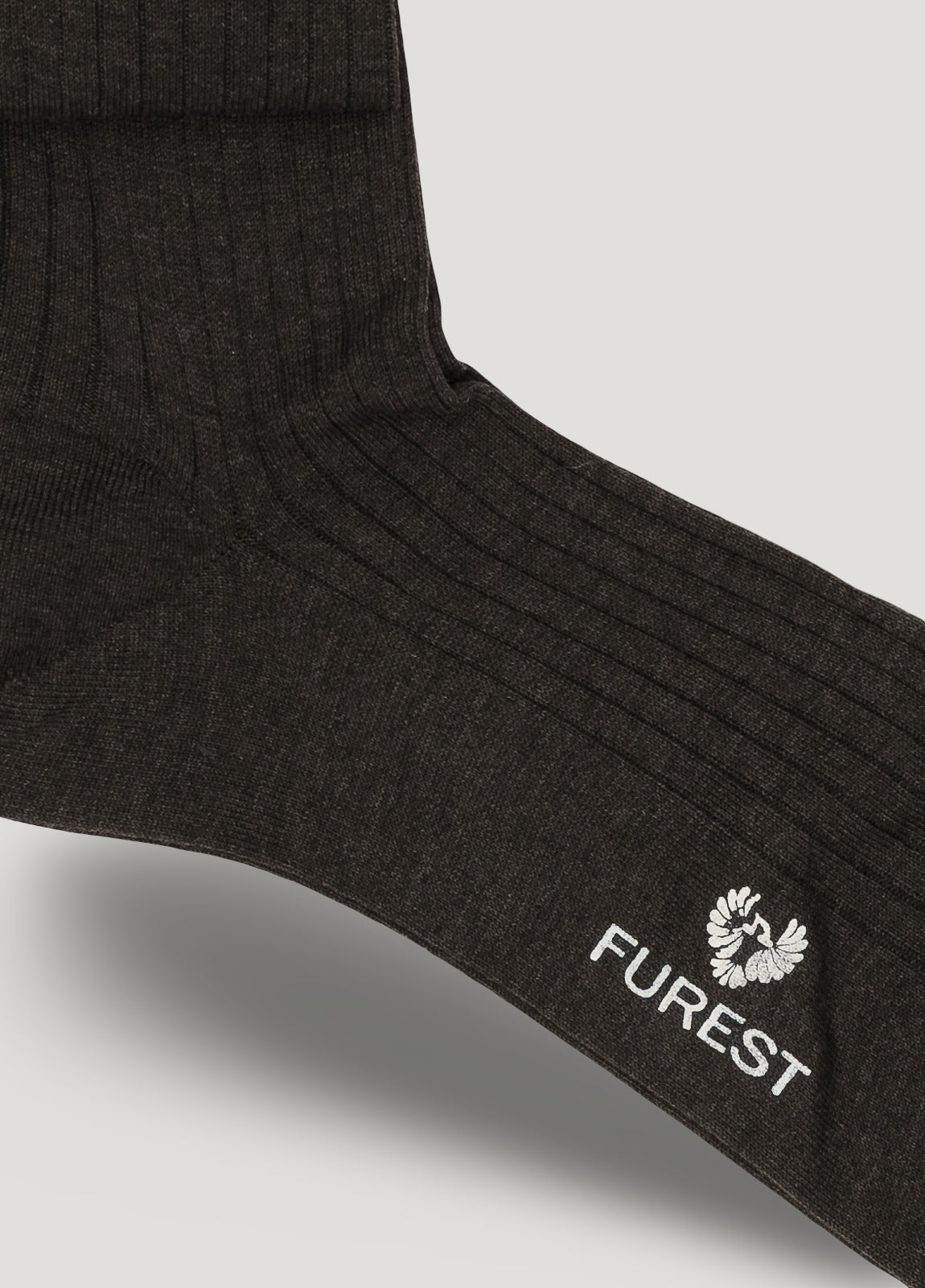 Long charcoal grey sock made of Scottish yarn