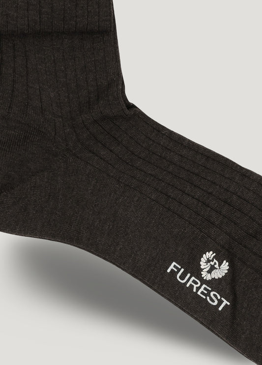 Long charcoal grey sock made of Scottish yarn