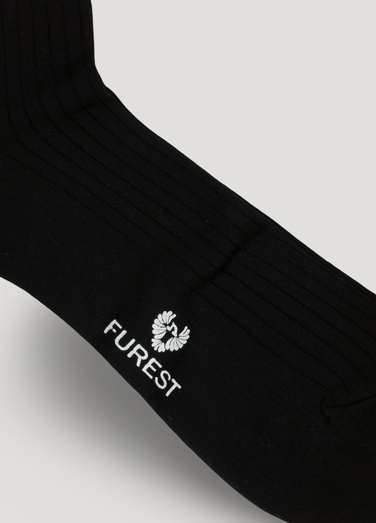 Long black Scottish yarn sock