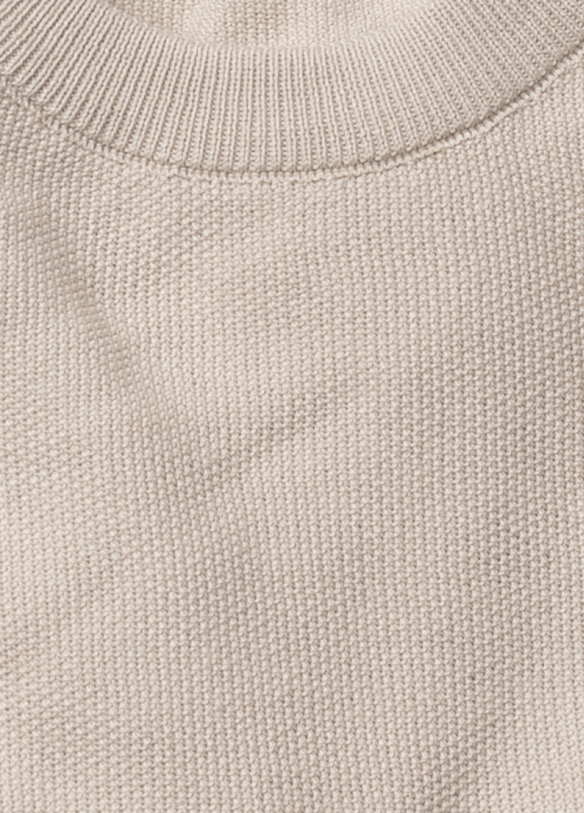 Jersey cuello redondo punto arroz beige.