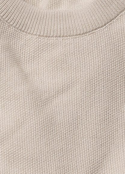 Jersey cuello redondo punto arroz beige.