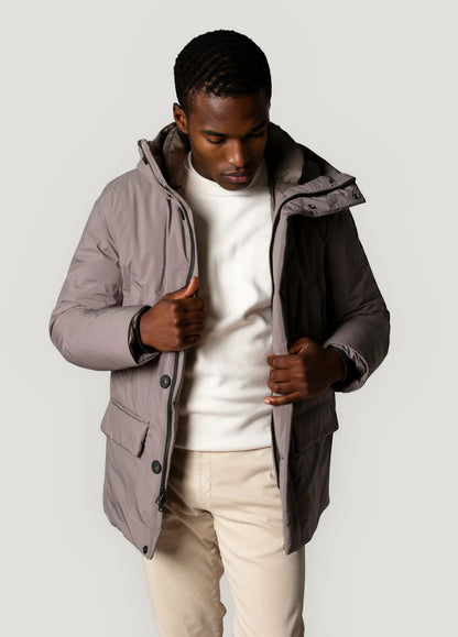 Navy blue technical parka with hood