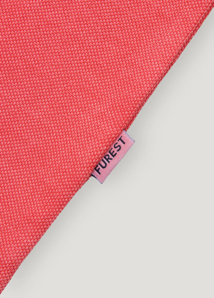 Polo manga corta garment dye pique coral