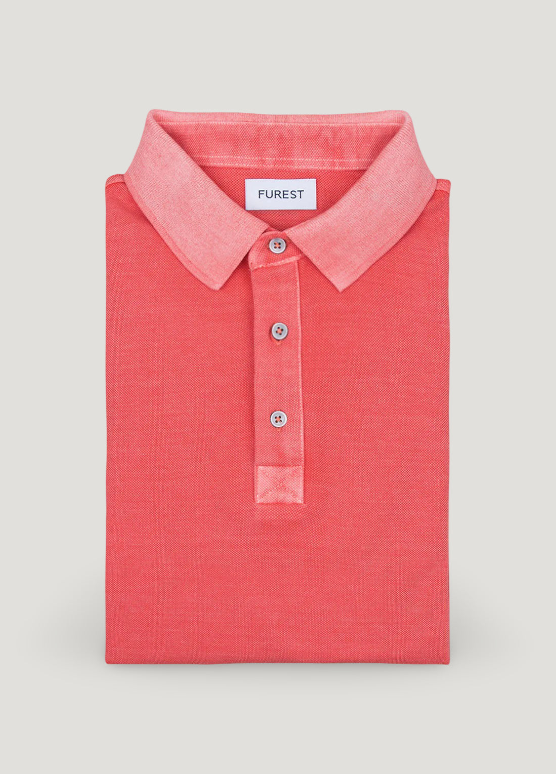Polo manga corta garment dye pique coral