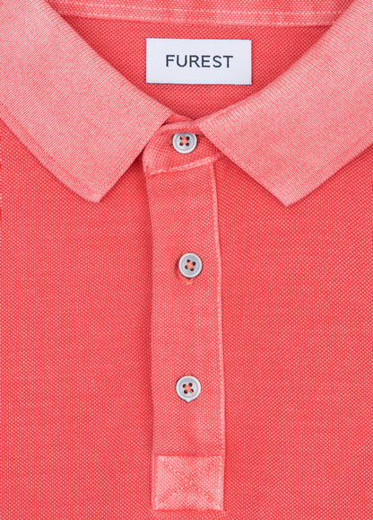 Polo manga corta garment dye pique coral