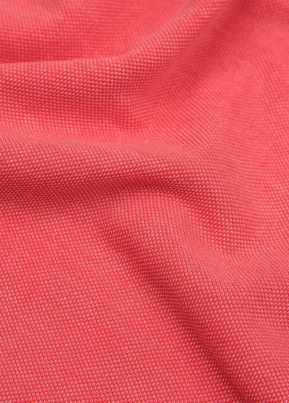 Polo manga corta garment dye pique coral