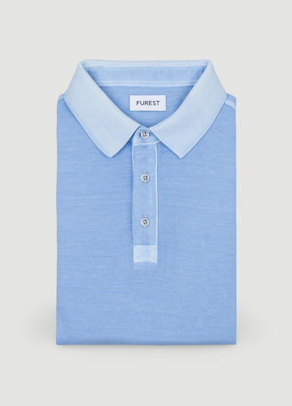 Polo manga corta garment dye pique celeste