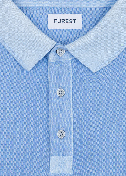 Polo manga corta garment dye pique celeste