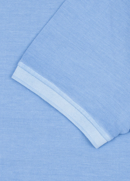Polo manga corta garment dye pique celeste
