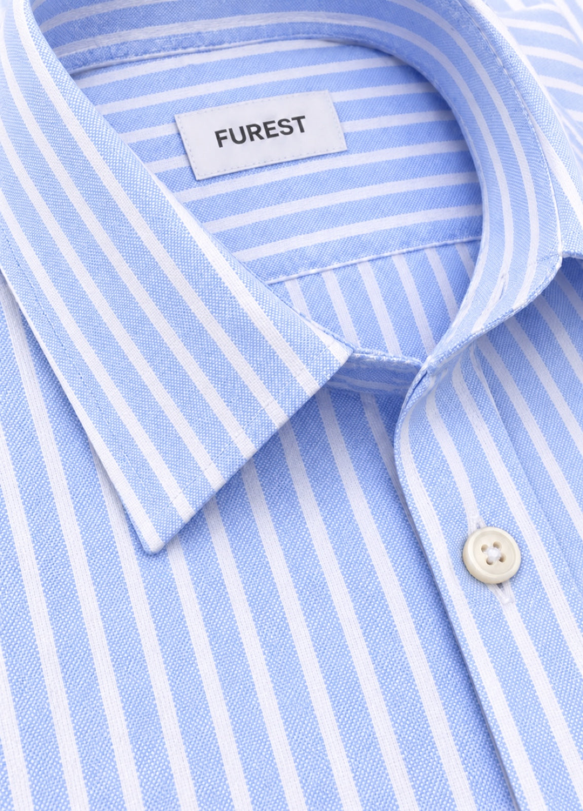 Camisa Regular Raya Ancha Celeste