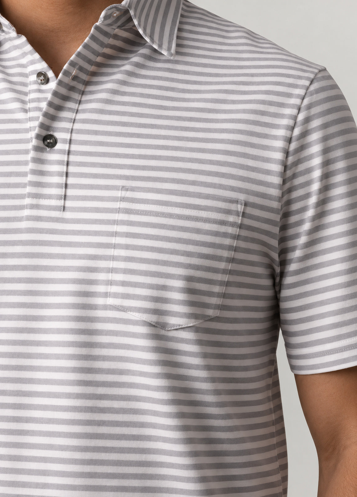 Polo manga corta rayas gris