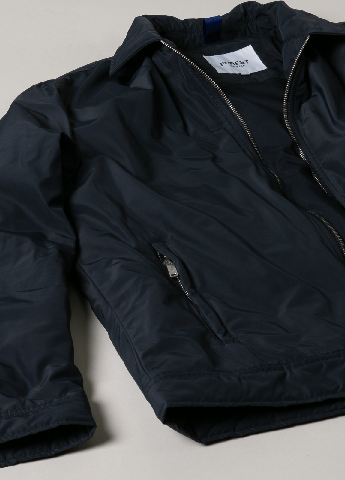 Cazadora técnica marino