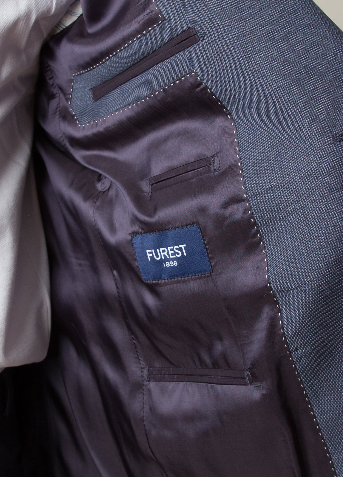Traje textura azul