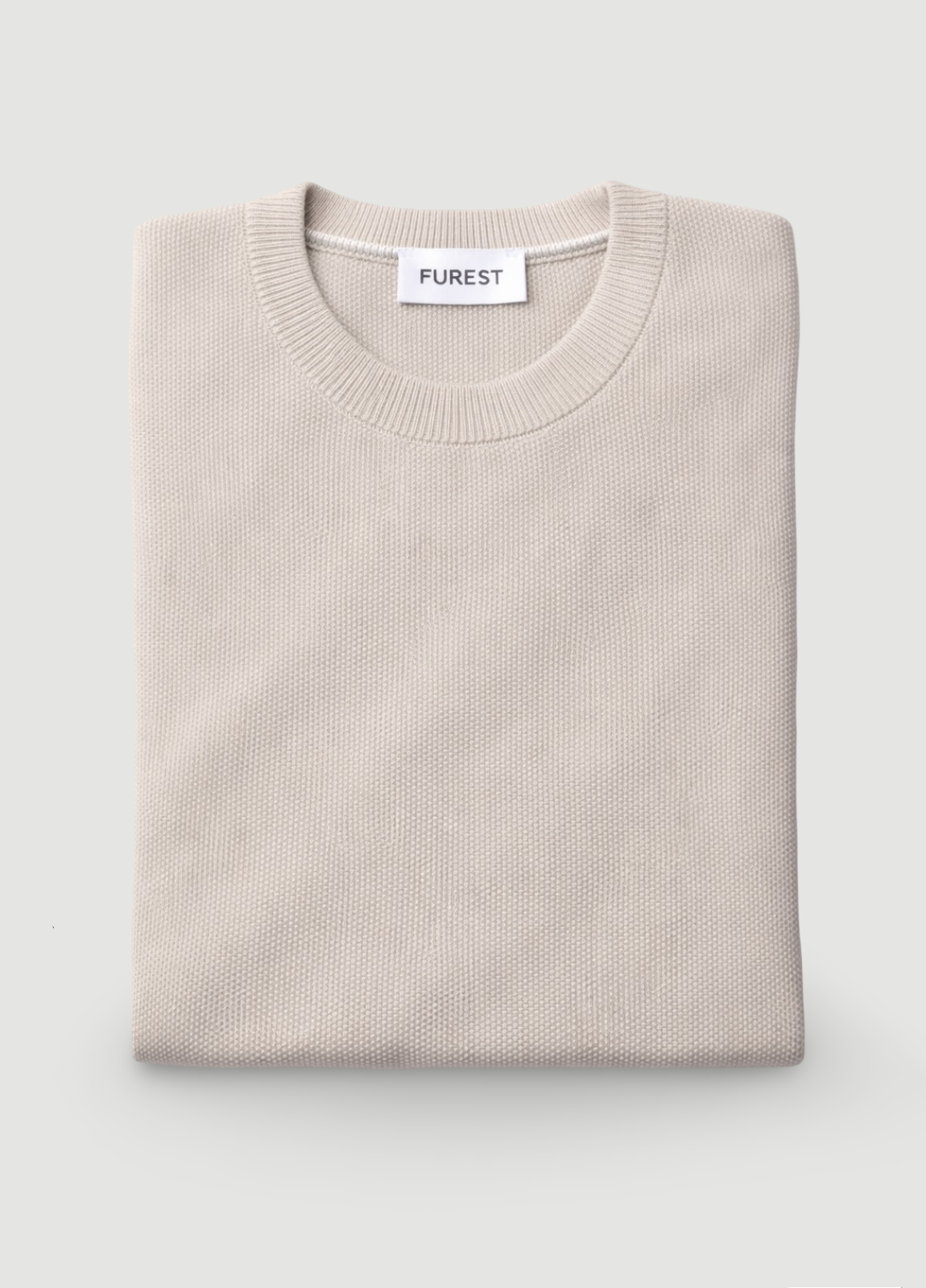 Jersey cuello redondo punto arroz beige.