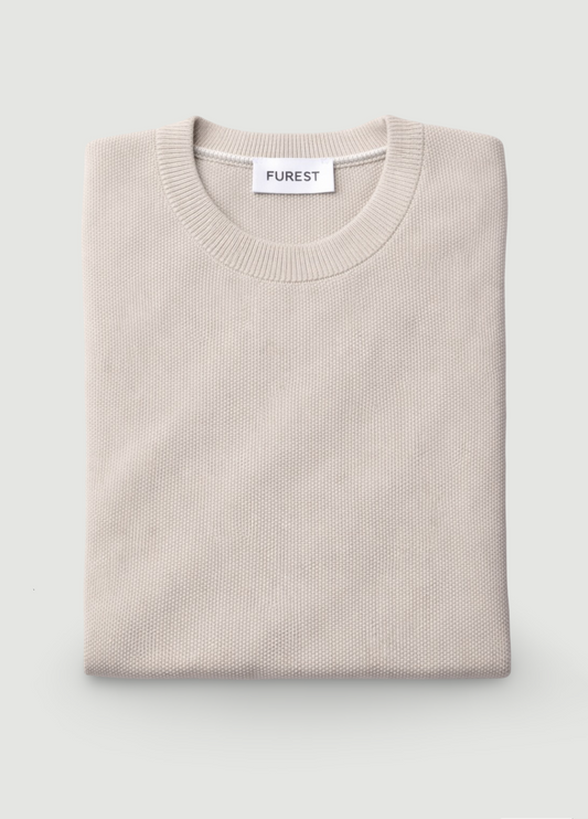 Jersey cuello redondo punto arroz beige.