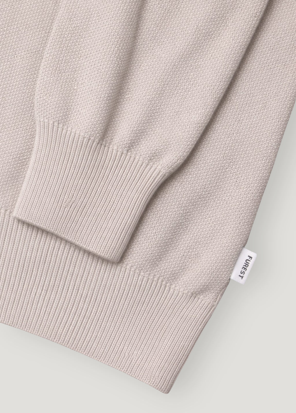 Jersey cuello redondo punto arroz beige.