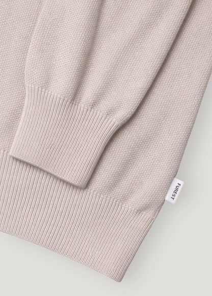 Jersey cuello redondo punto arroz beige.