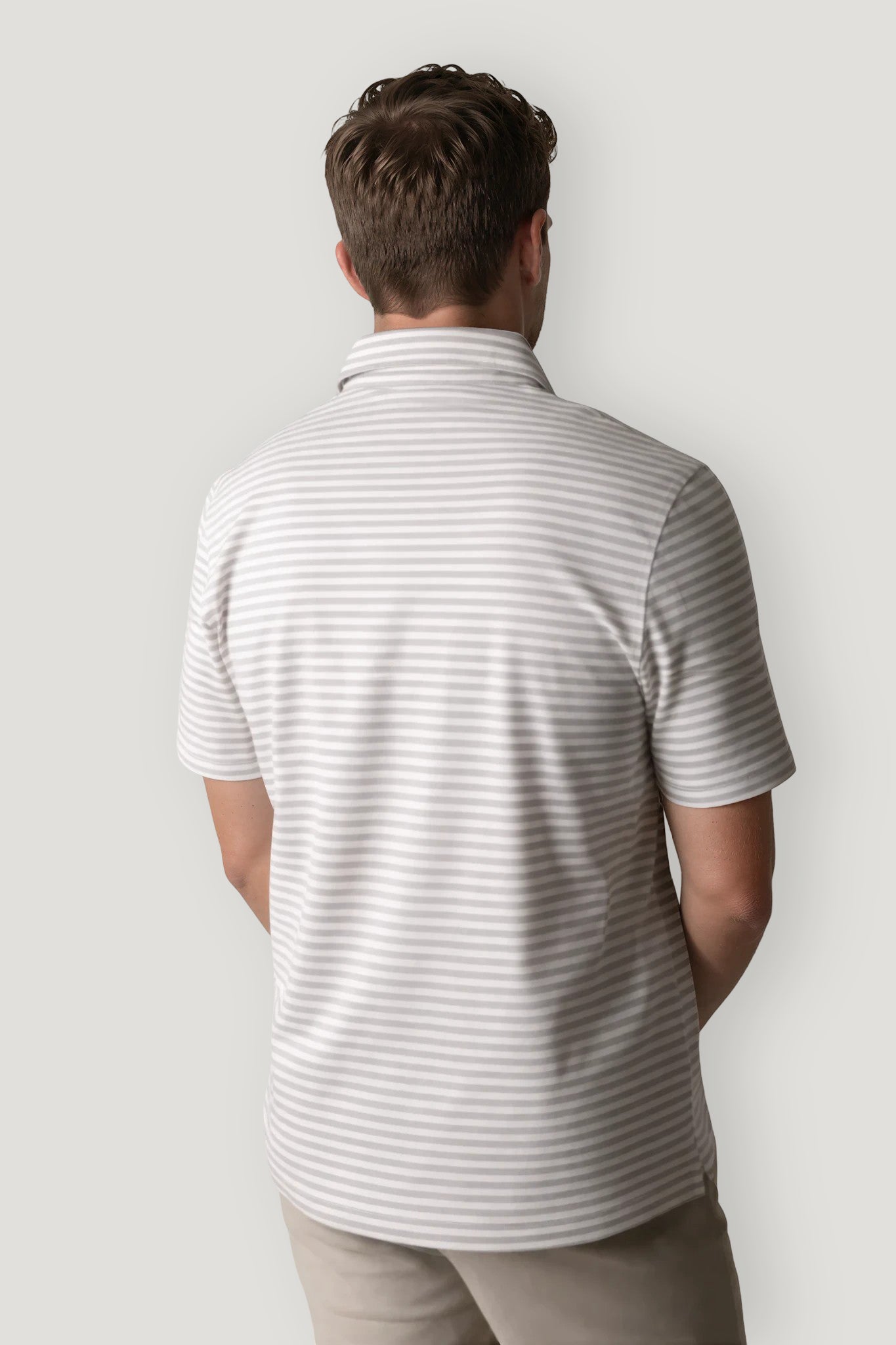 Polo manga corta rayas gris