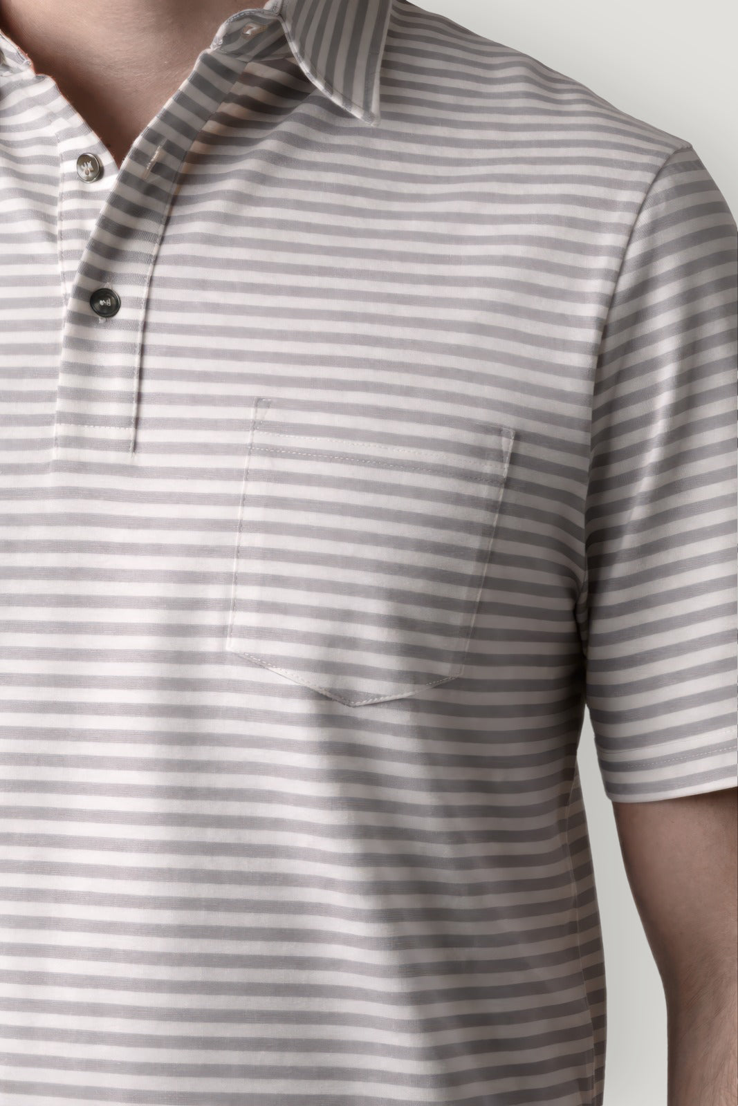 Polo manga corta rayas gris