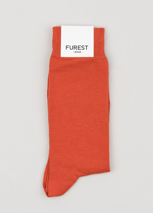 Calcetín corto liso rojo.