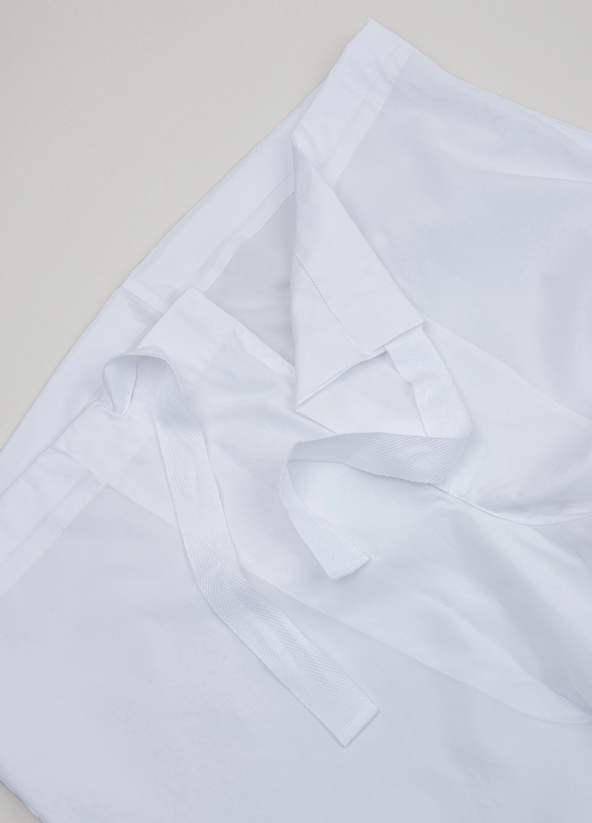 Plain white long pajamas with pillowcase included