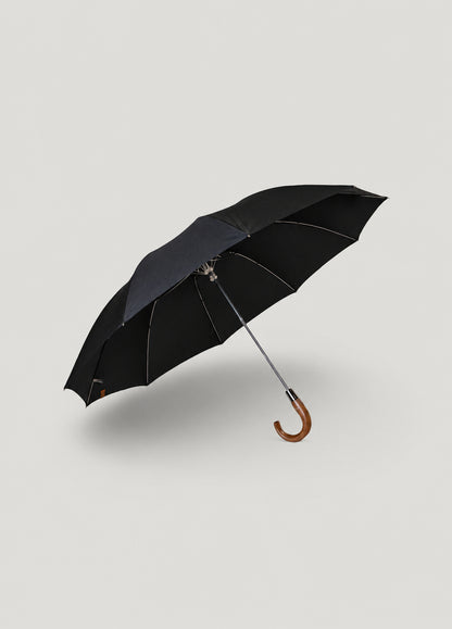 Paraguas plegable negro con puño de madera