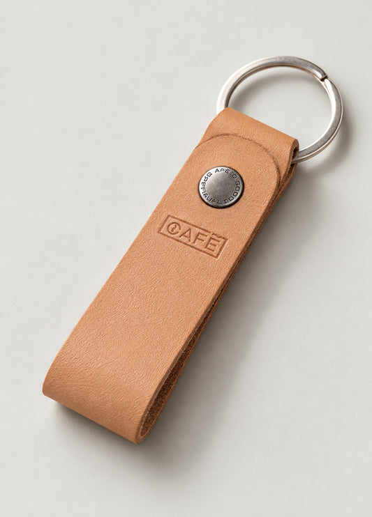 Llavero de piel color beige