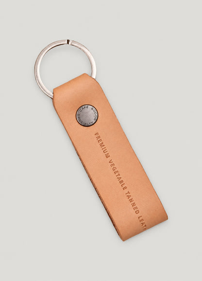 Llavero de piel color beige
