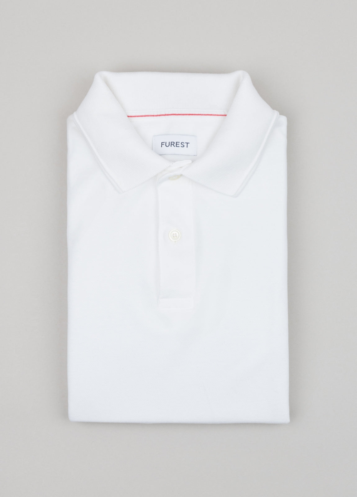 Polo manga larga piqué blanco