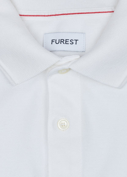 Polo manga larga piqué blanco
