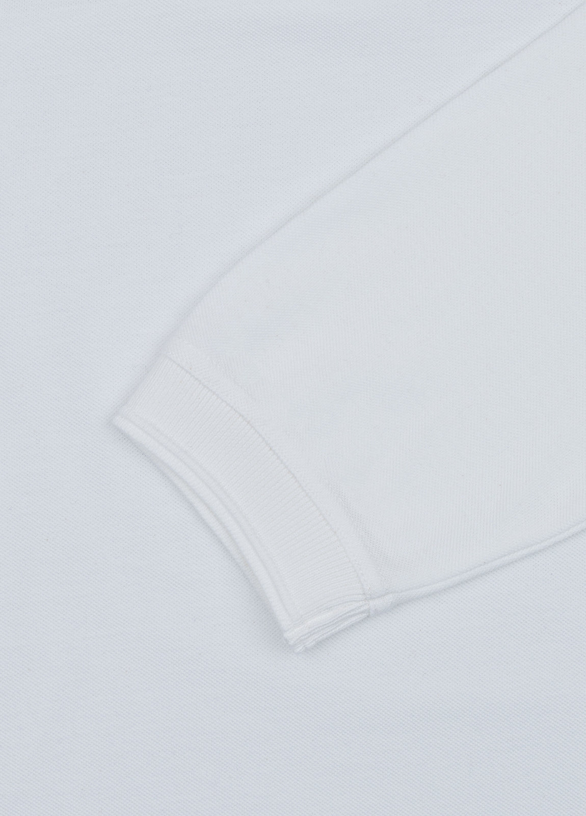 Polo manga larga piqué blanco